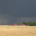 Dark clouds over fields